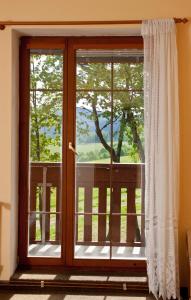 Rõdu või terrass majutusasutuses Apartmány Šumava