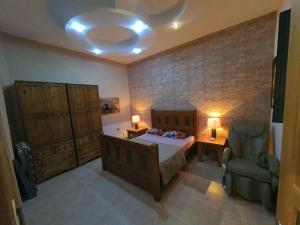 Кровать или кровати в номере Ta' Marija Home