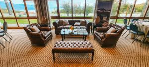 Uma área de estar em Wyndham Garden Ushuaia Hotel del Glaciar