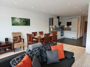 Køkken eller tekøkken på Ferienwohnung Penthouse Wolke 16 mit Schwimmbad und Saunanutzung