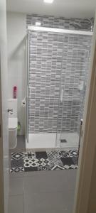 a bathroom with a shower stall with a toilet at Casa francisca in Arroyo de la Encomienda +33 photos