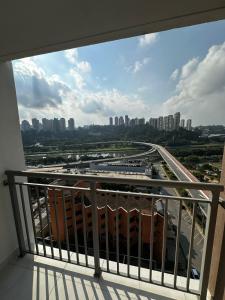 a view of a city from the balcony of a building at Laguna 380 - 1607B - Vista Palácio Tangará in São Paulo