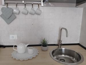 Virtuvė arba virtuvėlė apgyvendinimo įstaigoje Casa Cavour
