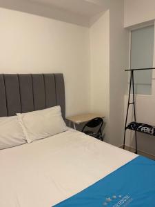 Postel nebo postele na pokoji v ubytování Hotel House