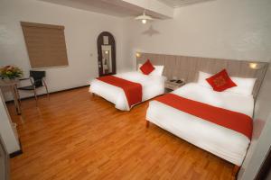 Cama ou camas em um quarto em Royal Inka II