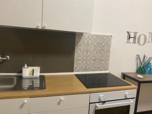 a kitchen with a sink and a counter top at Casa Elisa 8 in Bellaria-Igea Marina