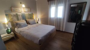 Postel nebo postele na pokoji v ubytování Casa do Vale - DOURO