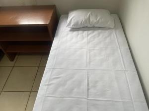 Cama o camas de una habitación en i9 Hotel
