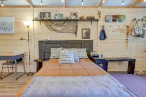 a bedroom with a bed and a table and a chair at Eagles Nest Studio in Rising Fawn Creek Access in Rising Fawn