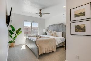 a white bedroom with a bed and a window at St George Home with Patio - 8 Mi to Snow Canyon! in St. George +31 photos