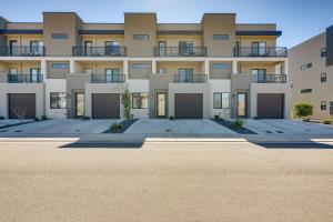 a large apartment building with a large parking lot at St George Home with Patio - 8 Mi to Snow Canyon! in St. George