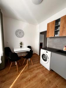 Kuchyň nebo kuchyňský kout v ubytování Apartman “Timravy”