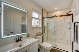 a bathroom with a sink and a toilet and a shower at The Kraken Wildwood Townhome half Mi to Beach! in Wildwood