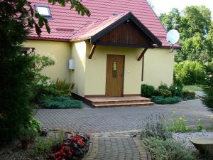 Ogród w obiekcie Domek pod Lasem na Mazurach
