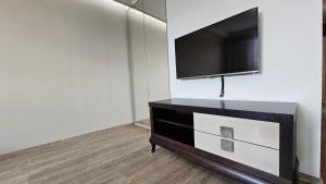 TV a/nebo společenská místnost v ubytování Wygodny apartament