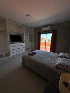 Ένα ή περισσότερα κρεβάτια σε δωμάτιο στο Cañuelas Duplex