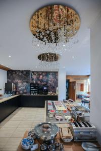 Kuchyň nebo kuchyňský kout v ubytování Arthotel ANA Flair