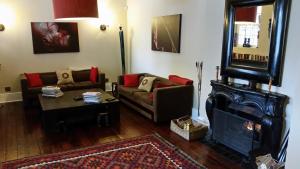 Χώρος καθιστικού στο Jardin d'ébène Boutique Guesthouse