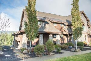 a wooden house with trees in front of it at Great Location Near Pool with Suncadia Pool Access in Cle Elum
