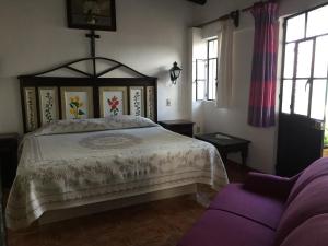 Postel nebo postele na pokoji v ubytování MARGARITA Hotel + 16 fotografií