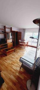 a living room with a couch and a table at HABITACIÓN EN BILBAO in Bilbao