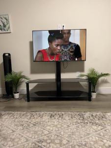 a flat screen tv sitting in a living room at Docker in Timberlea +4 photos