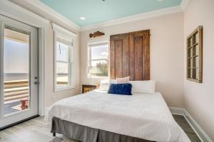 a bedroom with a bed and a window at Long Beach Home with Views and On-Site Beach Access! in Long Beach