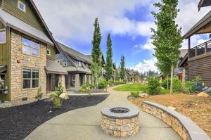 a house with a fire pit in the middle of a driveway at Great Location Near Pool with Suncadia Pool Access in Cle Elum