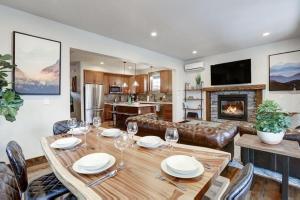 a dining room and living room with a table and chairs at Great Location Near Pool with Suncadia Pool Access in Cle Elum