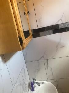Koupelna v ubytování OverNite Comfort