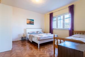 Fotografia z galérie ubytovania Apartments with a parking space Vinisce, Trogir - 1165 v destinácii Vinišće