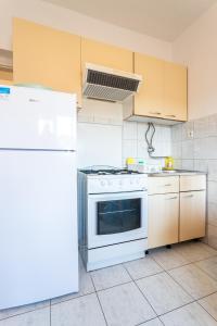 Fotografia z galérie ubytovania Apartments with a parking space Vinisce, Trogir - 1165 v destinácii Vinišće
