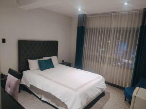 Blub Hotel Spa客房内的一张或多张床位