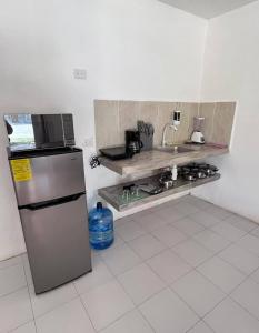 Kuchyň nebo kuchyňský kout v ubytování Departamento Dzirul + 6 fotografií