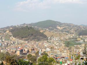 a view of a city with a mountain at COMMUNITY HOLIDAY INN in Panauti