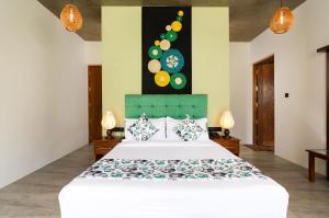 Letto o letti in una camera di Tara Waterfall