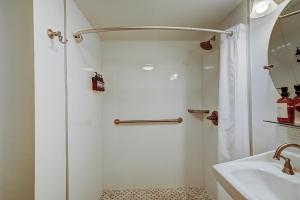 a bathroom with a shower and a sink at Cute 1 bedroom unit located in Condo Hotel in the heart of Coconut Grove Free Parking in Miami +20 photos