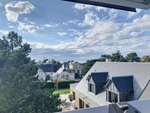 a view from the roof of a house at Villa au Calme avec Jardin, Proche Plage et Commerces, Wifi et Équipements Complets - FR-1-361-117 in Jullouville-les-Pins