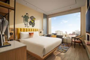 Postel nebo postele na pokoji v ubytování Hyatt Centric Ballygunge Kolkata