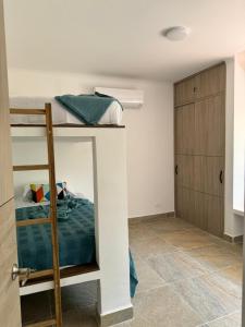 Postel nebo postele na pokoji v ubytování TIZIANO RELAX 106
