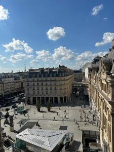 a large square in a city with buildings at En plein cœur de Paris Saint-Lazare Hausman / Paris center Hausman Opera in Paris