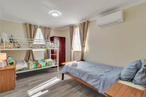 Ένα ή περισσότερα κρεβάτια σε δωμάτιο στο Bonnie Home