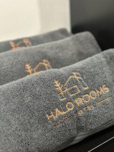 a towel with the words have room on it at Halo Rooms Hotel in Wakaf Baharu