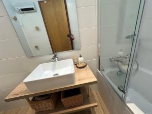 a bathroom with a sink and a shower at Appartement Vars, 4 pièces, 6 personnes - FR-1-773-25 in Vars