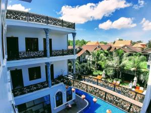 an aerial view of a resort with a swimming pool at Sweethome Resort & Spa Phú Quốc in Phú Quốc