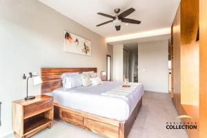 A bed or beds in a room at Nuevo Estudio en Aria Ocean 609