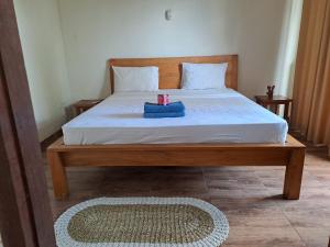 Postel nebo postele na pokoji v ubytování Kutabay Homestay
