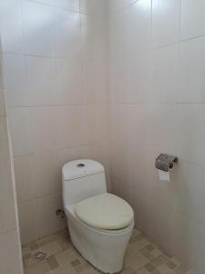 Koupelna v ubytování Kutabay Homestay