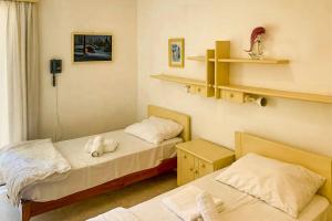 Postel nebo postele na pokoji v ubytování Seafront apartment in Gozo, Marsalforn - Happy Rentals