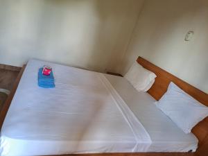 Postel nebo postele na pokoji v ubytování Kutabay Homestay